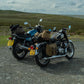 Two modern classic motorcycle with canvas panniers and tail bags