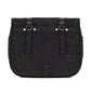 The back of a black waxed canvas motorcycle pannier bag with side release buckles and a detachable shoulder strap.