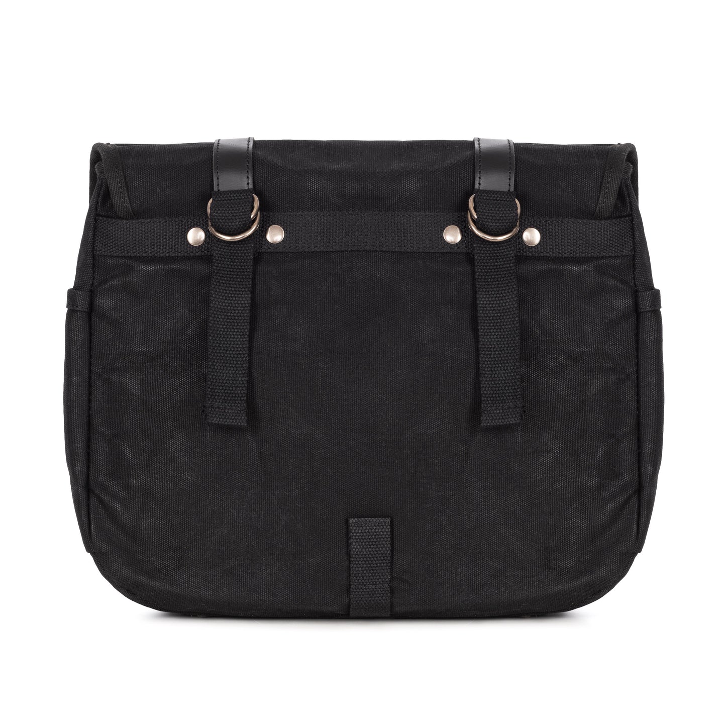 The back of a black waxed canvas motorcycle pannier bag with side release buckles and a detachable shoulder strap.