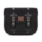 A black waxed canvas motorcycle pannier bag with side release buckles and a detachable shoulder strap.