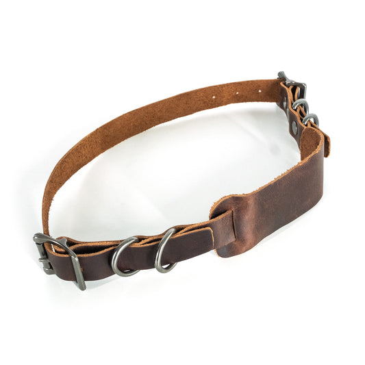 Brown leather seat strap for mounting motorcycle luggage with metal hardware on a white background